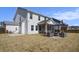 Charming home backyard with a cozy fire pit and screened-in porch at 624 Sienna Way, Summerville, SC 29486