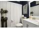 Stylish half-bathroom featuring elegant vanity, marble countertop, and chic decor at 624 Sienna Way, Summerville, SC 29486