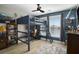 Stylish bedroom with a loft bed, desk, and a large window at 624 Sienna Way, Summerville, SC 29486