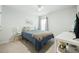 Neutral bedroom featuring contemporary decor, a ceiling fan, and natural light at 634 Jancus St, Charleston, SC 29414