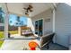 Inviting covered patio featuring comfortable seating and a stylish orange side table at 634 Jancus St, Charleston, SC 29414