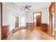 Charming dining room featuring hardwood floors, wainscoting, and a bay window at 643 Semaht St, Charleston, SC 29412