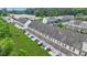 This aerial view shows an ideal townhome community, a great location near stores and a beautiful landscape at 711 Hemingway Cir, Summerville, SC 29483