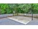 Outdoor basketball court with a fence and a bench, perfect for recreational activities at 711 Hemingway Cir, Summerville, SC 29483