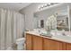 Bathroom featuring double sink vanity, neutral walls, tile floor and framed mirror at 711 Hemingway Cir, Summerville, SC 29483