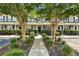 Attractive townhome facade with lush landscaping, inviting entrance, and well-maintained exteriors at 711 Hemingway Cir, Summerville, SC 29483