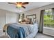 Comfortable bedroom featuring plush bedding, soft natural light and neutral paint at 711 Hemingway Cir, Summerville, SC 29483