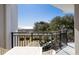 Balcony with outdoor dining set and views of the beach, dunes, and Gulf of Mexico at 7600 Palmetto Drive # D-222, Isle of Palms, SC 29451