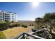Beautiful coastal view from the balcony with landscaping and clear ocean view at 7600 Palmetto Drive # D-222, Isle of Palms, SC 29451