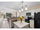 Eat-in kitchen featuring modern appliances, countertops and fixtures, open to the dining and living areas at 7600 Palmetto Drive # D-222, Isle of Palms, SC 29451