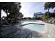 Pool area with hot tub, multiple pools, and lounging chairs with umbrellas at 7600 Palmetto Drive # D-222, Isle of Palms, SC 29451