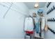 Bright walk-in closet with ample shelving and hanging space for organized storage at 7977 Shadow Oak Dr, North Charleston, SC 29406
