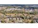 An aerial view captures neighborhood houses situated near meandering creeks and green marshes at 8585 Refuge Pointe Cir, North Charleston, SC 29420