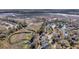 A sprawling aerial view shows community homes beside winding creeks and marshland at 8585 Refuge Pointe Cir, North Charleston, SC 29420