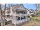 A multi-story home with multiple decks and a patio area is an outdoor entertainer's delight at 8585 Refuge Pointe Cir, North Charleston, SC 29420