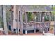 A covered gazebo with picnic tables and outdoor fireplace offers a great space for gathering outdoors at 8585 Refuge Pointe Cir, North Charleston, SC 29420