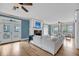Spacious living room with fireplace, hardwood flooring, and access to outdoor balcony at 8585 Refuge Pointe Cir, North Charleston, SC 29420