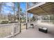 Outdoor patio features spacious deck and a lovely view of the landscaped yard at 8585 Refuge Pointe Cir, North Charleston, SC 29420
