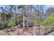 Overhead view of a community playground with a gazebo and a play structure amongst the trees at 8585 Refuge Pointe Cir, North Charleston, SC 29420