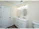 Well-lit bathroom with a double sink vanity providing ample counter space and storage at 8849 Kellum Dr, North Charleston, SC 29420