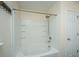 Clean bathtub with a white tile enclosure and shower head offering a comfortable bathing experience at 8849 Kellum Dr, North Charleston, SC 29420