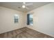 Comfortable bedroom featuring a ceiling fan and a window adding to the room's appeal at 8849 Kellum Dr, North Charleston, SC 29420