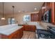 Modern kitchen with stainless steel appliances, granite countertops, and a gas range at 8849 Kellum Dr, North Charleston, SC 29420