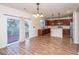Modern kitchen with stainless steel appliances, breakfast bar, and sliding glass doors to deck at 8849 Kellum Dr, North Charleston, SC 29420