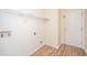 Laundry room features a wire shelf, hookups for a washer and dryer, and tile floors at 8849 Kellum Dr, North Charleston, SC 29420