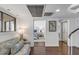 Finished basement with comfortable seating area, view to bedroom, and convenient access to bathroom at 9000 Palmetto Dr # G-302, Isle of Palms, SC 29451