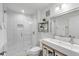 Contemporary bathroom with a glass-enclosed shower, vanity, and elegant fixtures at 9000 Palmetto Dr # G-302, Isle of Palms, SC 29451