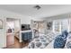 Comfortable main bedroom with TV, deck access, and bright natural light, offering a relaxing retreat at 9000 Palmetto Dr # G-302, Isle of Palms, SC 29451