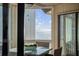 Relaxing sunroom with panoramic ocean views, perfect for enjoying coastal living at 9000 Palmetto Dr # G-302, Isle of Palms, SC 29451