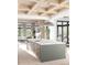 Open-concept kitchen with a large island, modern appliances, and stylish pendant lighting at 925 Fish Camp Rd, Charleston, SC 29492