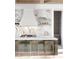 Contemporary kitchen with an island, sleek countertops, and bar stool seating at 925 Fish Camp Rd, Charleston, SC 29492