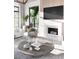 Cozy living room featuring a fireplace, modern decor, and comfortable seating area at 925 Fish Camp Rd, Charleston, SC 29492