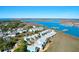 Breathtaking aerial view of waterfront community with docks, boats, and stunning waterfront views at 94 W 2Nd St, Folly Beach, SC 29439
