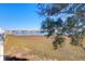 Balcony overlooking a marsh with views of the water and surrounding properties at 94 W 2Nd St, Folly Beach, SC 29439