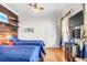 Bright bedroom with hardwood floors, two twin beds, and double closets at 94 W 2Nd St, Folly Beach, SC 29439