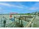 Dock with a boat lift ready for Your Boat Here, facilitating easy access to the water and boating activities at 94 W 2Nd St, Folly Beach, SC 29439