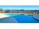 Beautiful community pool overlooking a serene bay, perfect for relaxing and enjoying the waterfront views at 94 W 2Nd St, Folly Beach, SC 29439