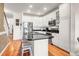 Well-equipped kitchen with granite countertops, modern appliances, and ample cabinetry at 94 W 2Nd St, Folly Beach, SC 29439