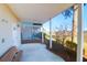Covered patio perfect for outdoor relaxation, boasting scenic views of the surrounding nature and marsh at 94 W 2Nd St, Folly Beach, SC 29439