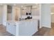 Beautiful kitchen featuring stainless steel appliances, a large island, and light gray cabinets at 103 Moscato Ln, Summerville, SC 29485