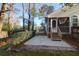 Home exterior featuring a cozy screened porch, patio, and lush landscaping at 109 Nelson Ct, Summerville, SC 29485
