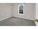 Bedroom view features a window with view and neutral colored walls and carpet at 109 Nelson Ct, Summerville, SC 29485