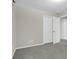 This bedroom features neutral colored walls and carpet with a double door closet and ceiling fan at 109 Nelson Ct, Summerville, SC 29485