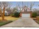 Attractive brick home with manicured lawn, driveway, and an attached two-car garage at 109 Nelson Ct, Summerville, SC 29485