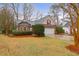 Charming brick home featuring manicured landscaping and an attached two-car garage at 109 Nelson Ct, Summerville, SC 29485