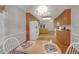 The eat-in kitchen features wood cabinets, plenty of counterspace, and natural light at 109 Nelson Ct, Summerville, SC 29485